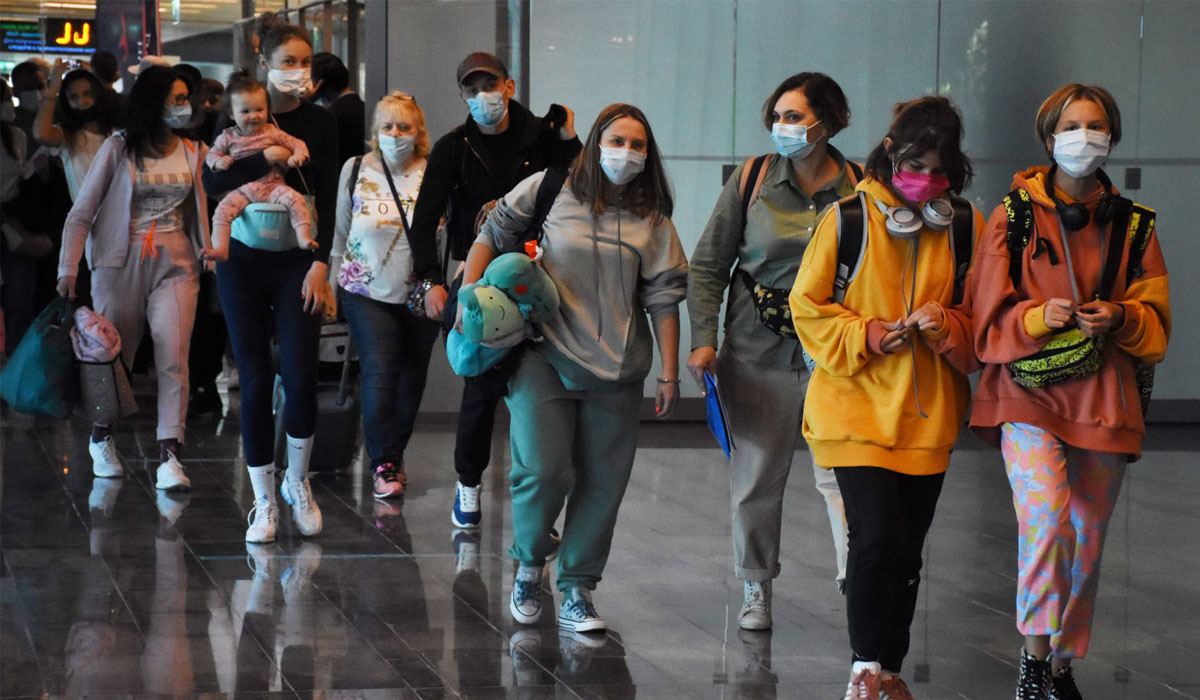 Tourists arrive at the airport in Mugla